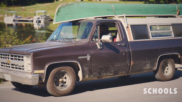 Dark brown with cap + canoe on top